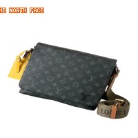 The classic black monogram canvas messenger bag of Louis Vuitton