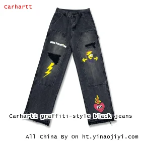 Carhartt graffiti-style black jeans