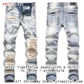 AMIRI light blue jeans with a hole - in - the - wind style